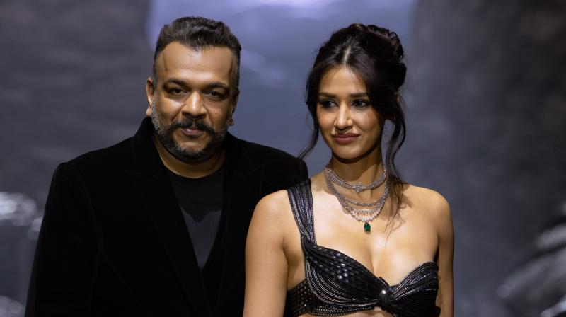 Designer Amit Aggarwal and actor Disha Patani at Lakmé Fashion Week showcasing Indriya's Orizon collection.