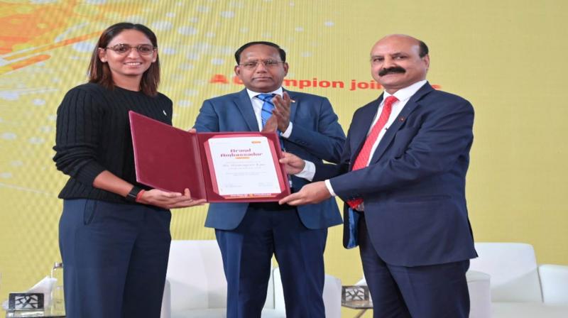 Harmanpreet Kaur at the bank's corporate office.