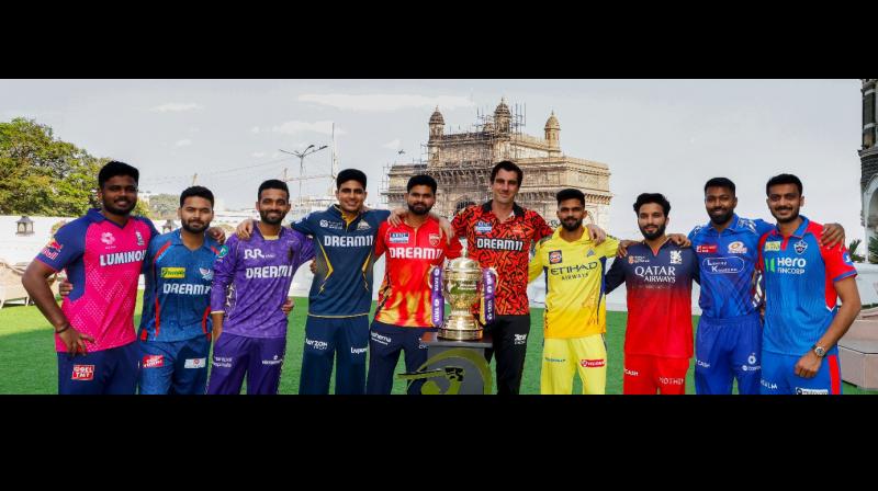 The team captains with the IPL trophy