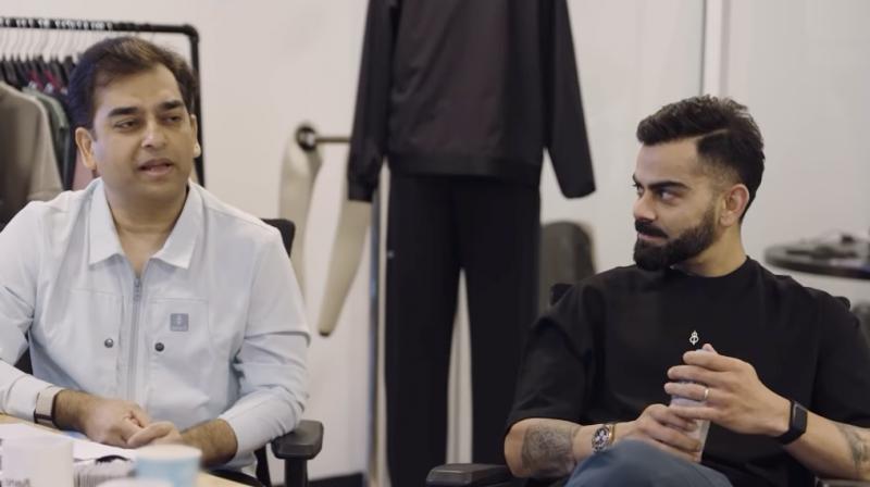 Abhishek Ganguly (left) and Virat Kohli