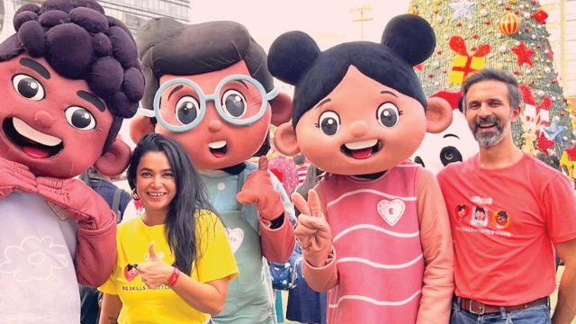 Pooja Jauhari (left) and Varun Duggirala with EMoMee's E, Mo and Mee characters.