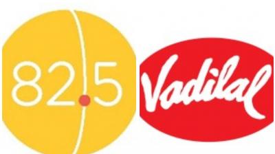 82.5 Communications X Vadilal logos