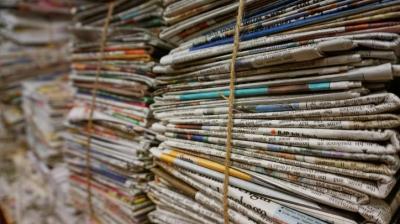 TAM AdEx's advertising report on print.