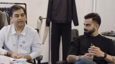 Abhishek Ganguly (left) and Virat Kohli